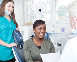 Patient and dentist discussing how to pay for dentistry