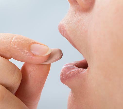 Patient taking sedative pill