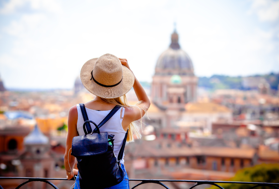 Traveler overlooking European city
